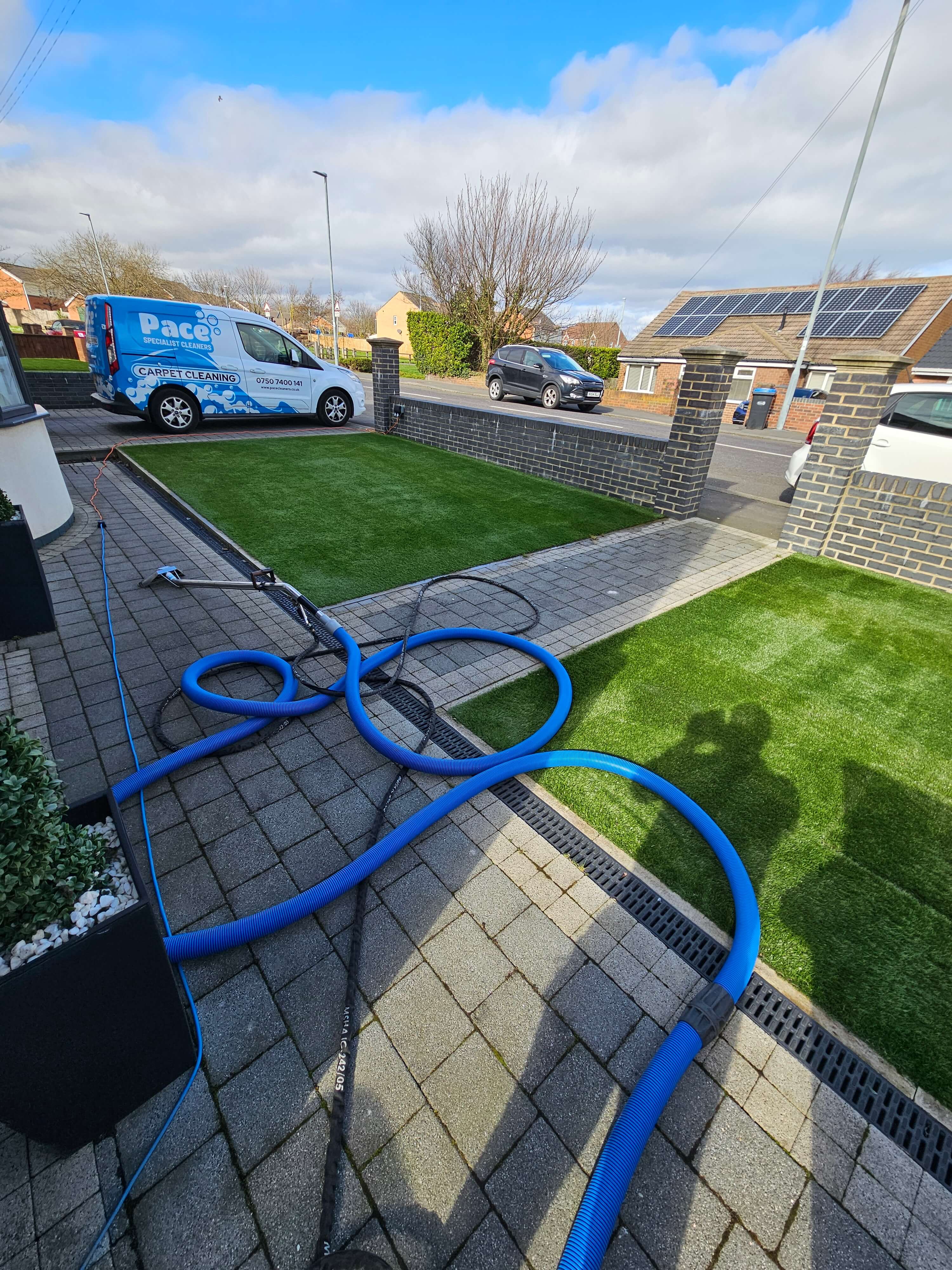 Professional artificial grass cleaning service in a Sunderland residential garden
